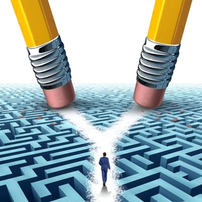 Conceptual illustration of two giant pencils erasing a path through a maze as a person walks along it, symbolizing problem-solving, clarity, and overcoming obstacles