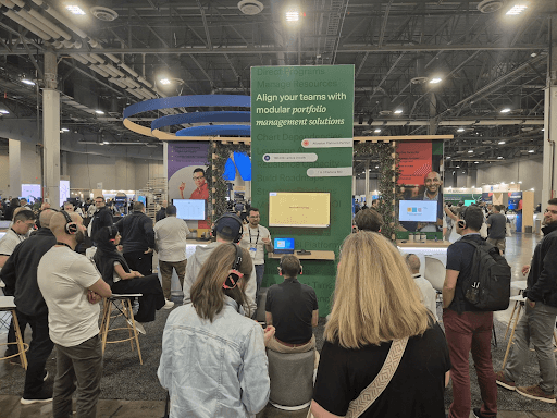 Team 24 showcase with people at convention center